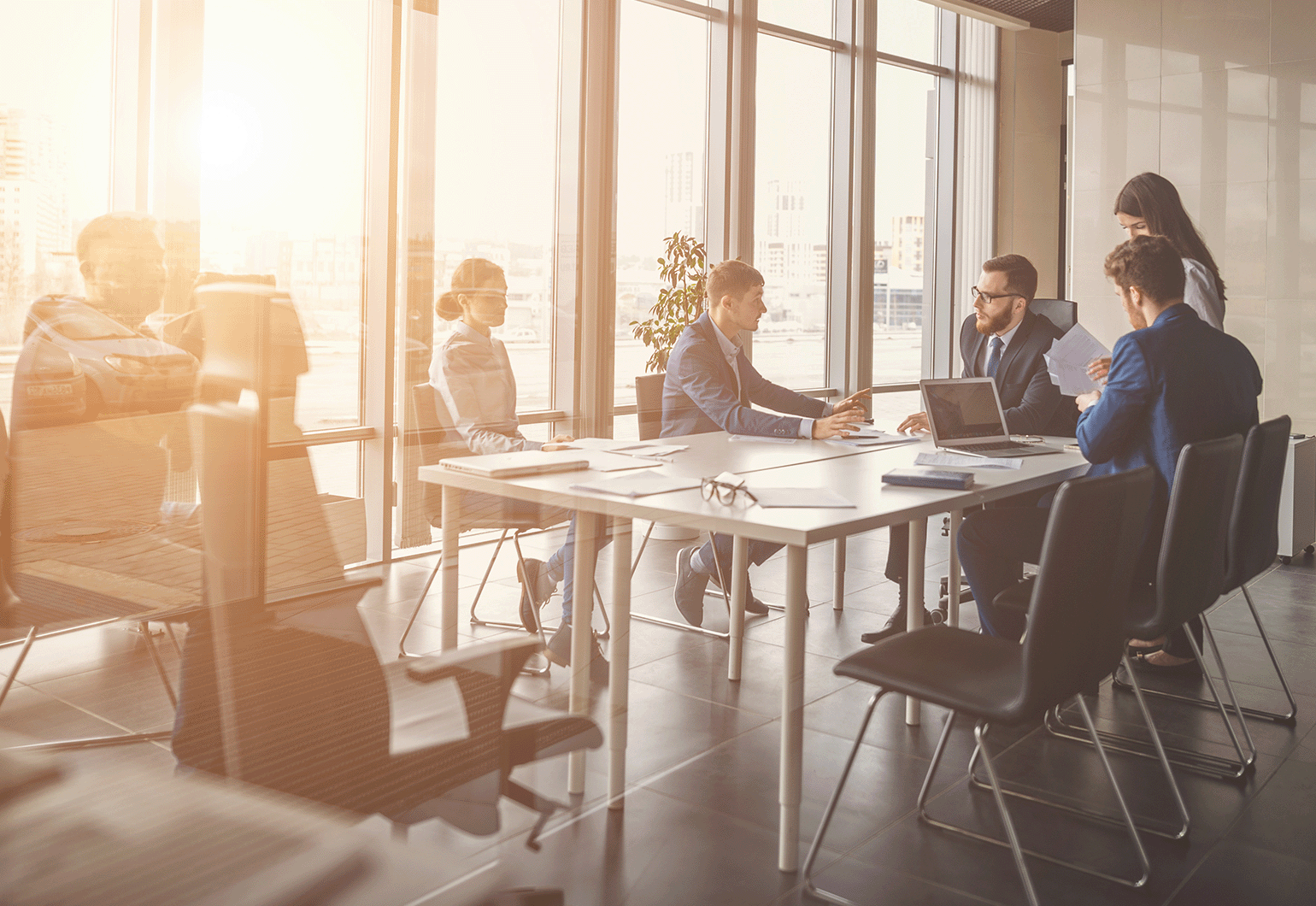 young professionals around a meeting table